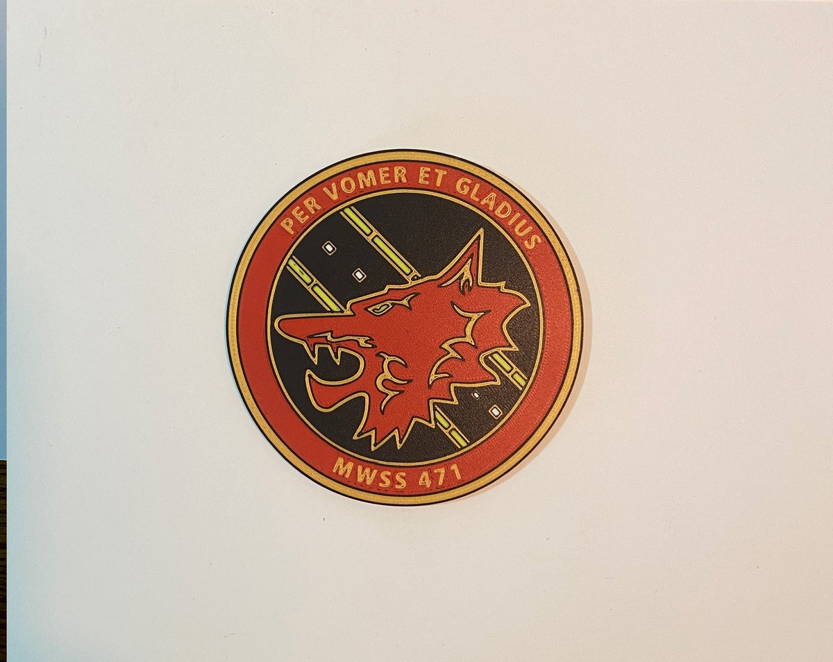 Photograph of the MWSS-471 3D-printed emblem by Heritage Forge Designs